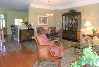 Custom Area Carpets, Townhome Interior Design, Rattan Accent Lounge Chair,  Cutom Fauzx Paint wall finishes, Fairfax, VA