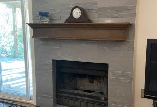 Fireplace remodeling and design, Porcelain Wall Tiles with Granite hearth, wood mantel, Burke, VA